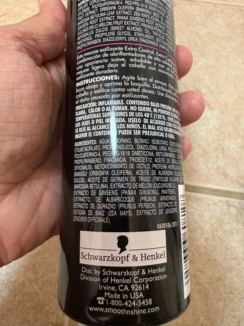 black bottle of Smooth 'N Shine Polishing Extra Hold Extra Body Styling Mousse